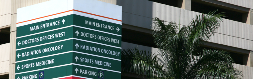 Exterior hospital wayfinding signage.